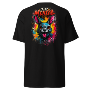 Back view of a black T-Shirt featuring a vivid blue, pink and yellow rabbit portrait beneath “Just Mental” lettering