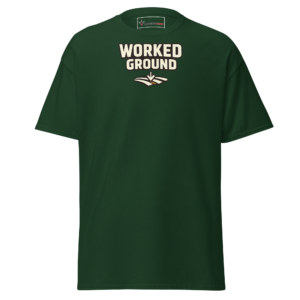 Front view of a forest-green T-Shirt featuring cream “Worked Ground” lettering above a stylised set of furrows
