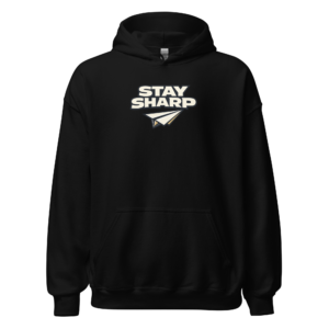 Back view of a black Hoodie featuring bold cream “Stay Sharp” lettering above a small angular blade-like graphic
