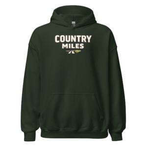 Front view of a forest-green Hoodie featuring cream “Country Miles” lettering above a small road-and-horizon motif