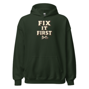 Front view of a forest-green Hoodie featuring cream “Fix It First” lettering above crossed spanner-and-screwdriver tools