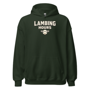 Front view of a forest-green Hoodie featuring cream “Lambing Hours” lettering above a small sheep-face illustration