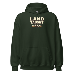Front view of a forest-green Hoodie featuring cream “Land Taught” lettering above a small furrowed-field motif