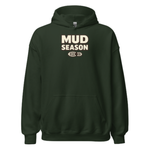 Front view of a forest-green Hoodie featuring cream “Mud Season” lettering above two muddy boot prints