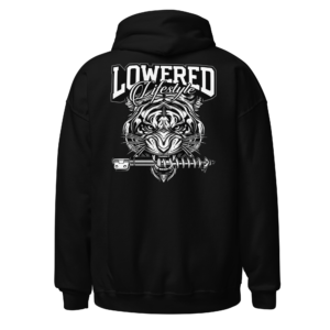 Back view of a black Hoodie featuring a monochrome lowered car and tiger graphic beneath “Lowered” lettering